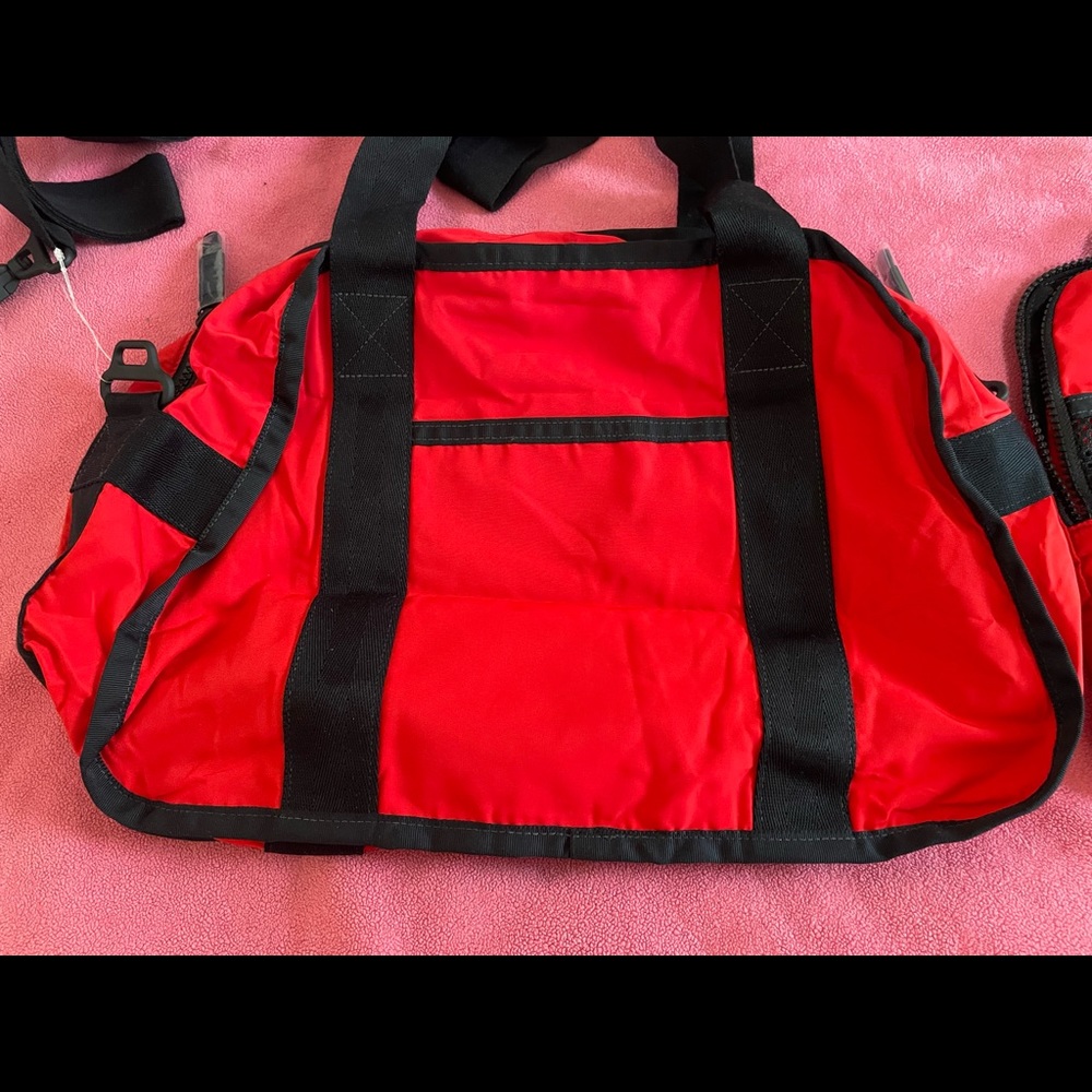LeSportsac red travel system bag, great for work bag